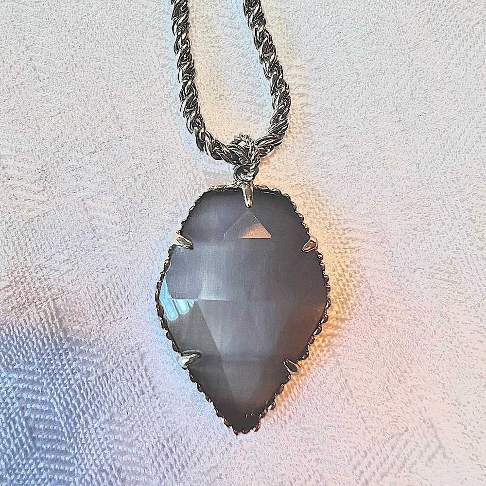 Kendra Scott gray and silver necklace.